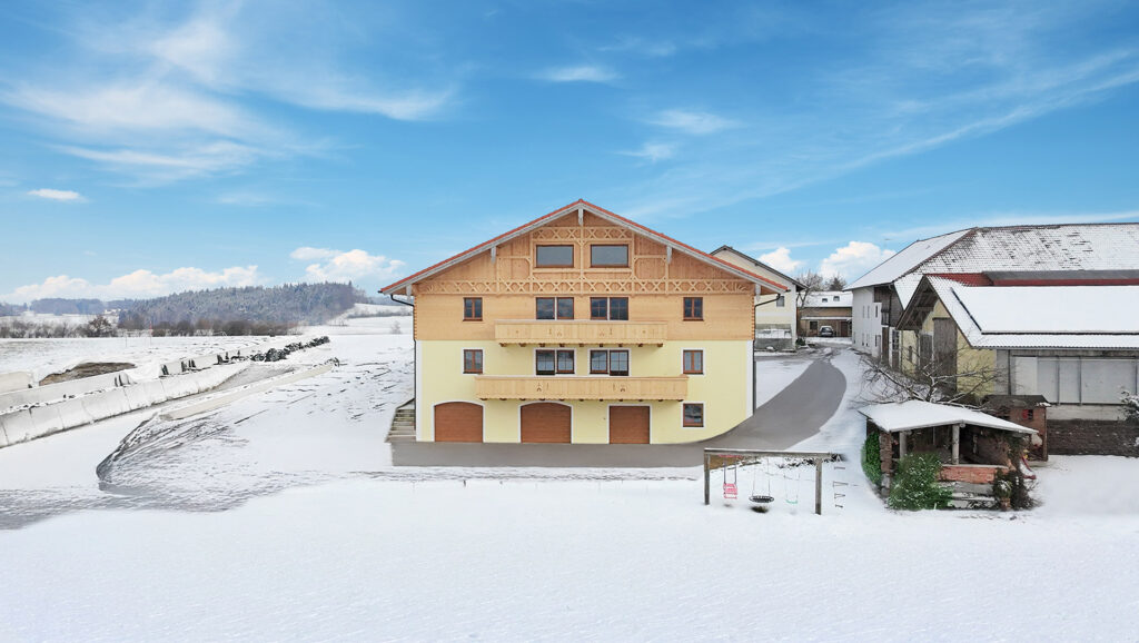 Winter am Stadlerhof mit Blick auf die Ferienwohnungen